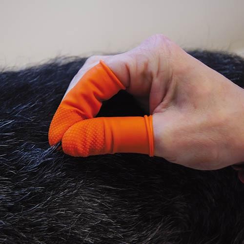 Doigtier en Latex Orange pour épilation - Petdesign.fr Setter Bakio S.L. Toilettage pour chien en France, produit de haute qualité