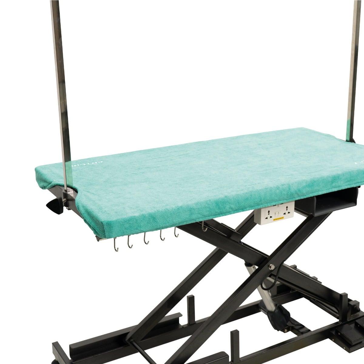 Serviette de table Artero Cumbia : posée sur une table de toilettage